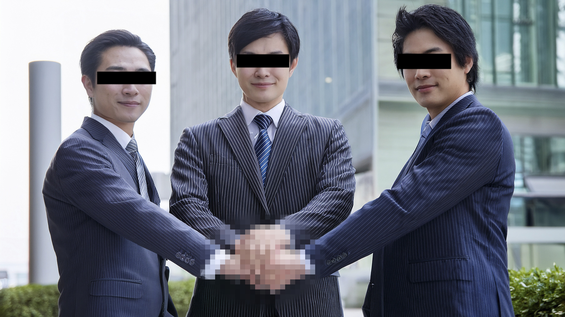 手をつなぐビジネスマン